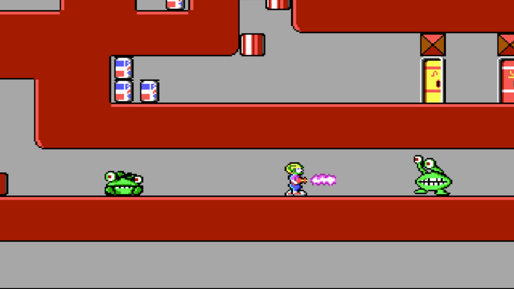 Commander Keen blasting a Garg with a raygun
