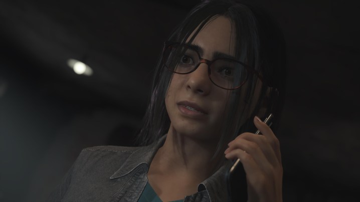Anita holds a phone in Silent Hill: The Short Message.