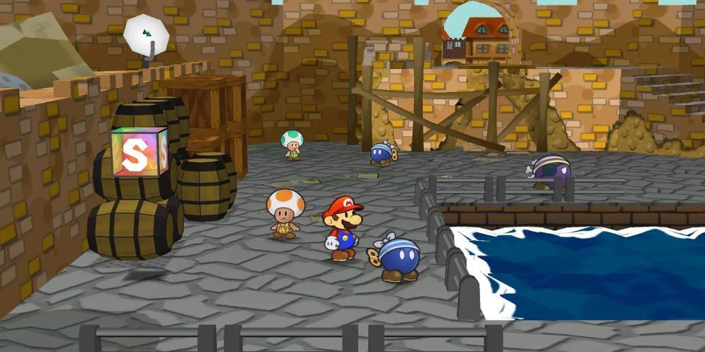 Mario, a Bob-Omb and a Toad standing around the pier in Paper Mario: The Thousand Year Door.