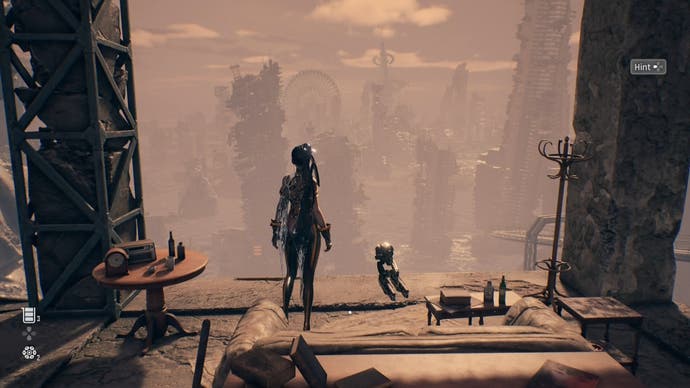 Eve standing with her drone beside her looking out from the rop of an open, unfinished building at a decimated city landscape in Stellar Blade.