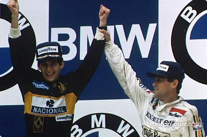 Winner Ayrton Senna with Patrick Tambay on the podium